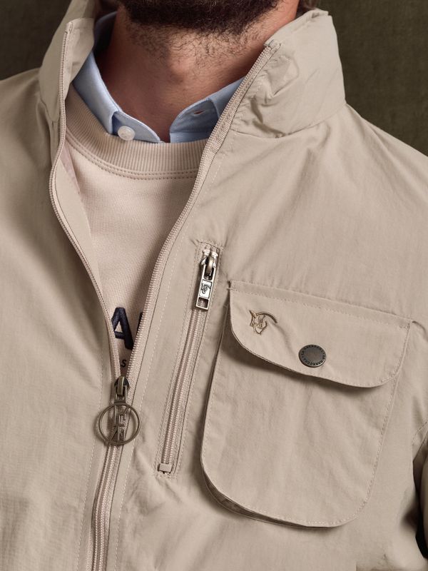 Jaqueta corta-vento técnica | Beige