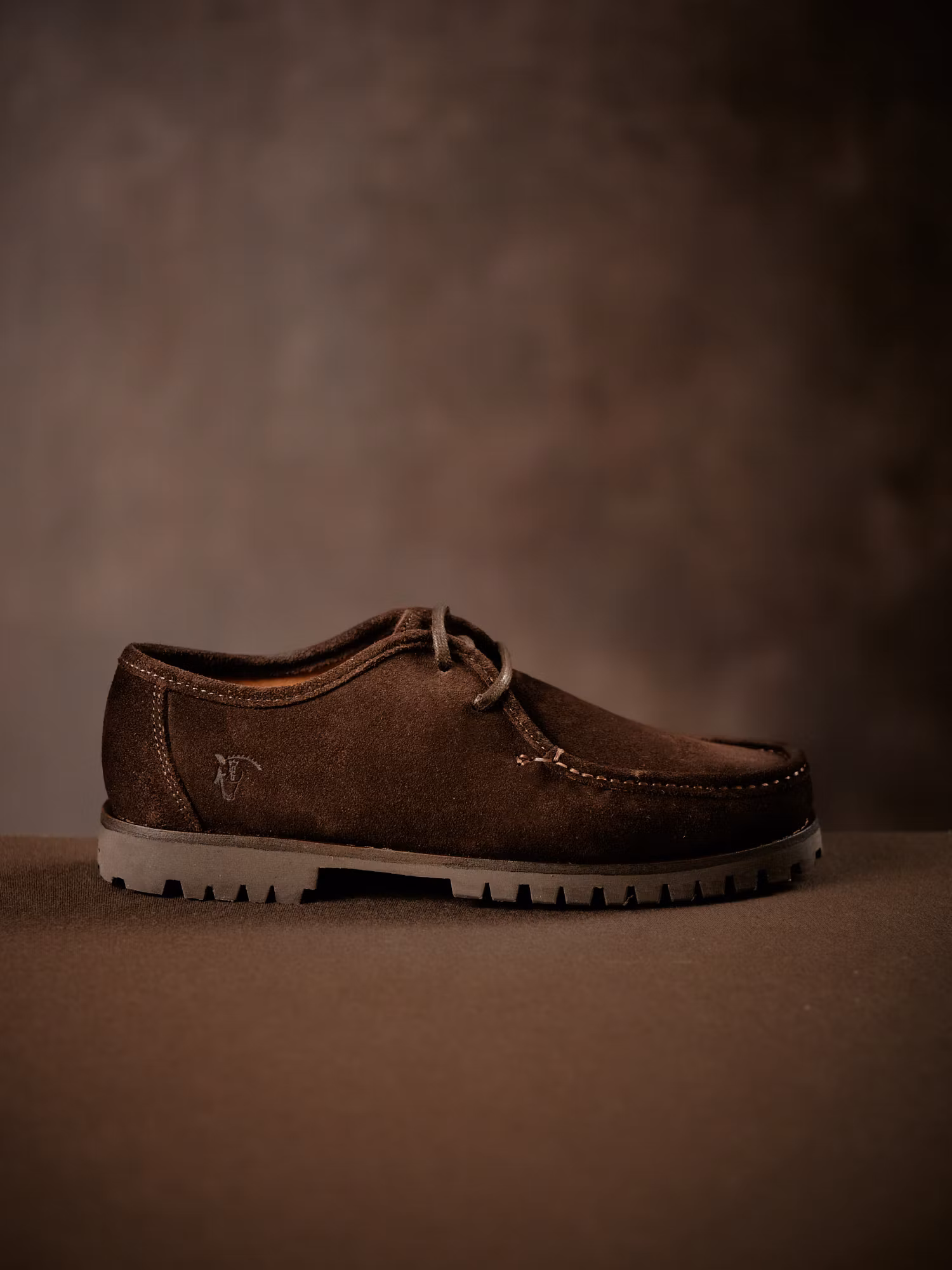 Sapato com atacadores